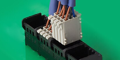 Close-up of 3M Mini Stack Connector being connected, ideal for space-constrained PCB applications

