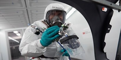 Person using an Accuspray device
