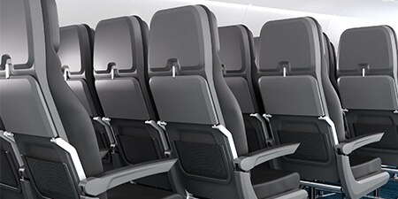 Rear close up of airplane seats
