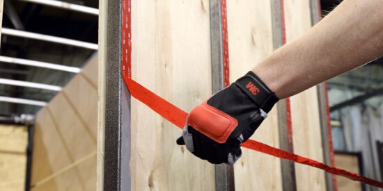 3M™ extreme sealing tape being applied to an interior vertical joint.
