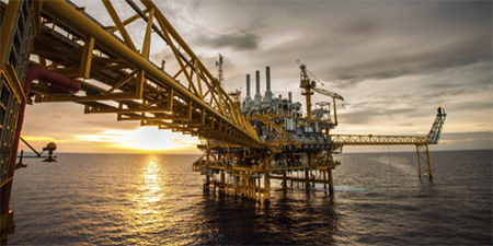oil and gas rig over water

