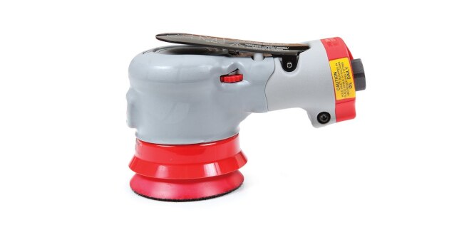 Hand held buffer.
