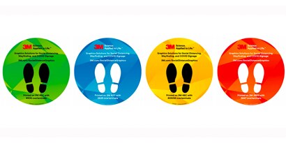 3M floor graphic film in a circular shape with social distancing messaging
