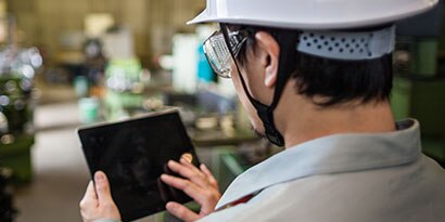 Worker looking at tablet
