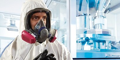 3M Respiratory protecting man from gases in industrial factory
