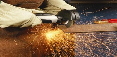 worker cutting sheet metal

