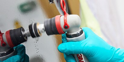 Remove defects with 3M™ Purple Finishing Film Hookit™ Disc PN 30367, P1500 or PN30366 P200 3