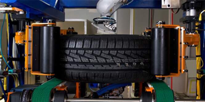 Automotive wheel and tire on a balance rack
