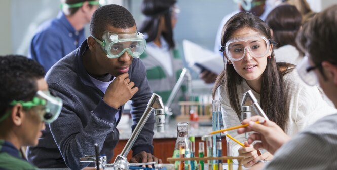 A group of students working together in a science laboratory.
