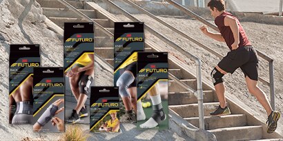 Man running up stairs wearing FUTURO Brand knee brace in the background with five FUTURO Braces and supports in package, in the foreground

