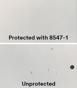 Example of the protective properties of 3M™ Polyurethane Protective Tape 8547-1 on a typical coating showing no damage to the part protected.