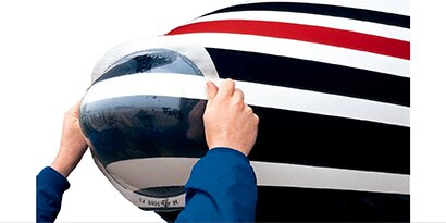 Hands mounting a Polyurethane Protective Boots on an aircraft
