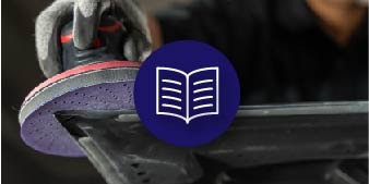 icon on background image of technician using orbital sander
