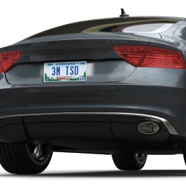 View of sportscar from rear, with a clear Indiana license plate that reads “3M TSD.”