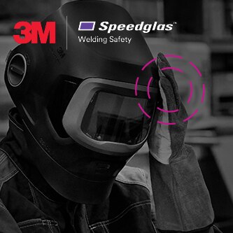 welder wearing 3M speedlgas welding helmet taping head
