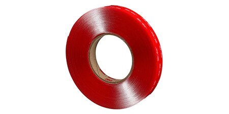 A side view of a roll of 3M™ VHB™ Tape from the 4910 product family.
