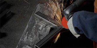 Image showing metalworking cleaning & grinding on mild steel process in action
