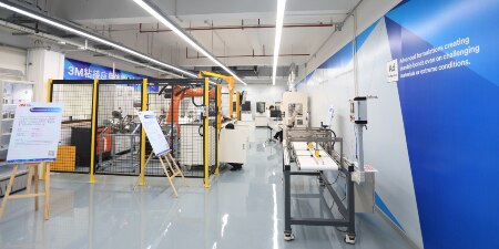 Image of the room including several machines at the Shanghai Bonding Process Center
