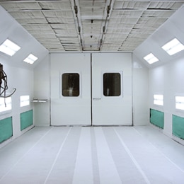 The inside of an empty paint spray booth.