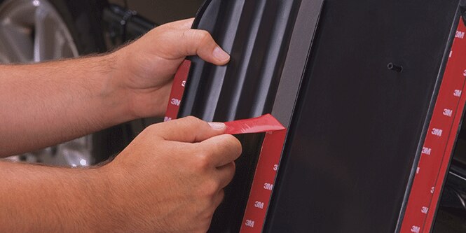 image of handles peeling off double sided tap for permanent seal
