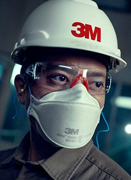 3M Disposable Respirator worn while using a saw