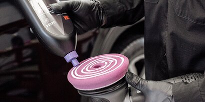 Hookit Foam Abrasive Disc being attached to dual action sander
