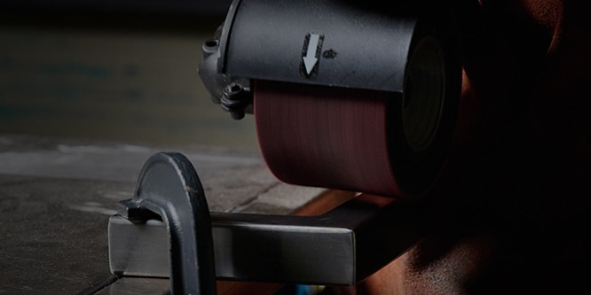 Image showing metalworking grinding & refining for a #4 finish on stainless steel
