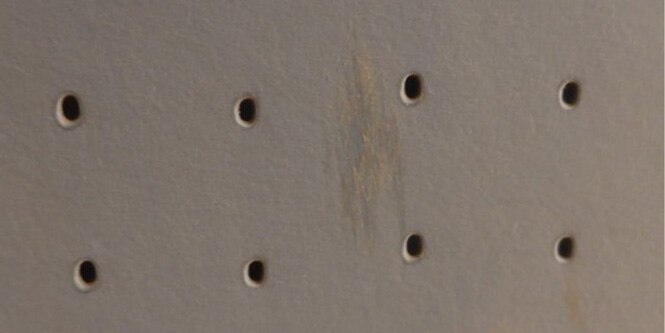 Impact on area of aircraft protected by 3M Tape 8642 without perforation.
