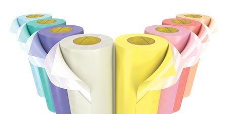 Multi-colored rolls of 3M Cushion-Mount Plus Training Tape arranged in a V-shape against a white background.

