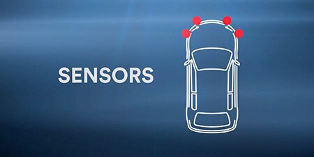 The outline of a vehicle with sensors highlighted
