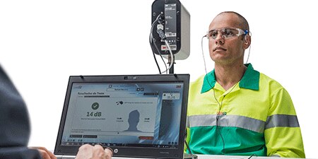 Worker going through dual-ear validation testing

