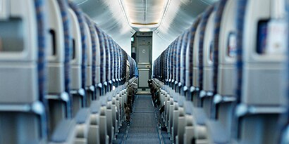 clean shot of aircraft cabin seats
