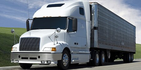 Large semi truck on highway.
