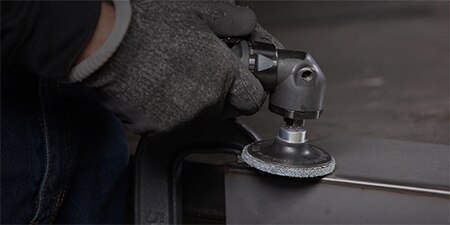 Image showing metalworking cutting & deburring on mild steel process in action
