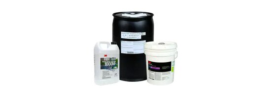 Two pails and a barrel of adhesives and sealants.

