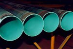 Row of internally coated pipe