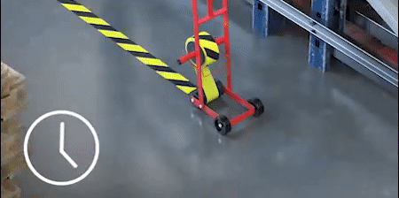 GIF image of a 3M™ Lane Marking Applicator M-1 laying down a black-and-yellow tape; overlay of a clock icon
