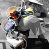 Worker at height weaing several pieces of fall protection PPE