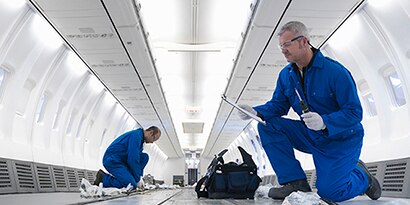 engineer assembling an aircraft interior
