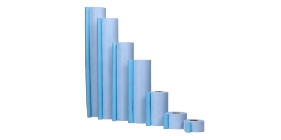 Seven rolls of liquid protection paper lined up in descending order of width.
