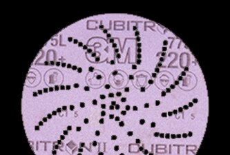 3M Xtract™ Cubitron™ II film disc 775L on black background
