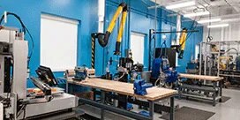3M Bonding Process Center with two tables with machines and equipment
