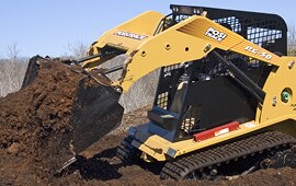 Yellow bulldozer with high performance paint moving dirt