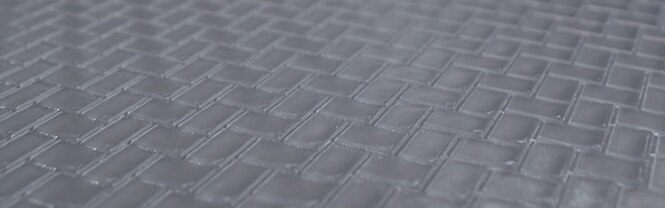 Close-up of 3M™ Trizact™ CMP Pad with groove design
