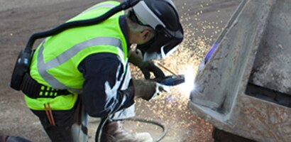 person welding with adflo PAPR
