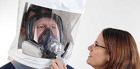person completing a respirator fit test
