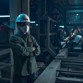 Man using a 3M Aura Respirator