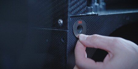 Person applying a 3M™ Friction Shim
