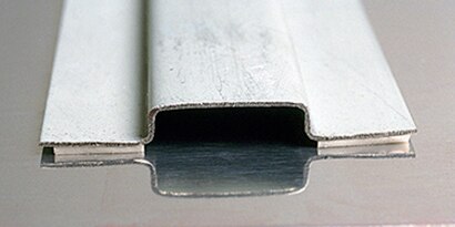 Metal substrates joined together with metal adhesive
