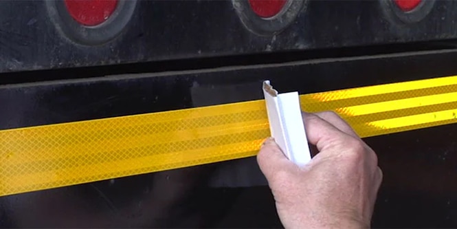 Watch the video to learn how to apply conspicuity tape on a vehicle
